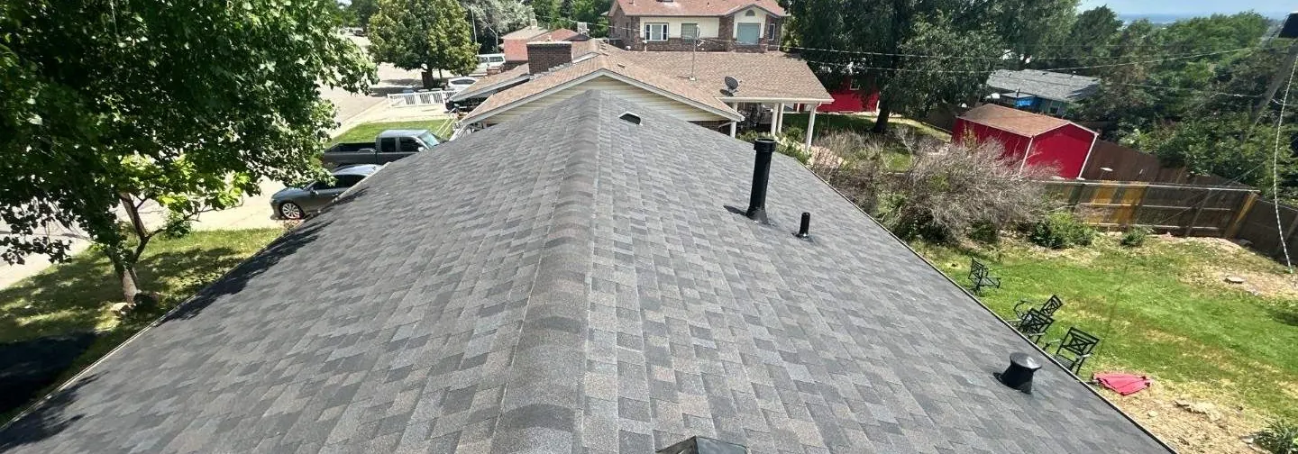After, Northglenn: aerial of a finished roof replacement on a tree-lined street