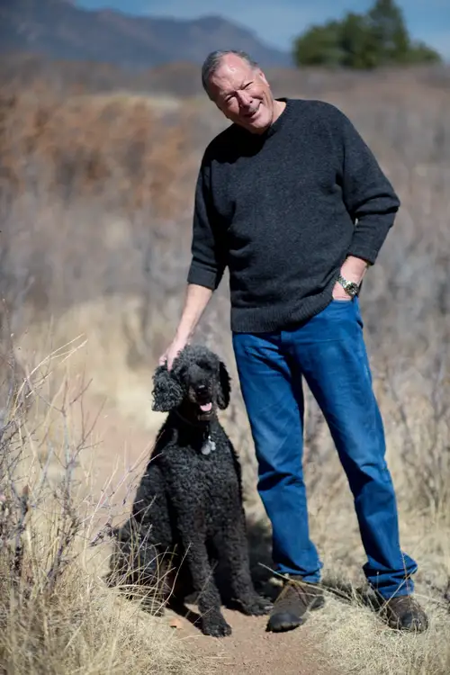 William H. Luden III, Chairman of Gen 3 Roofing Corp., with his Standard Poodle